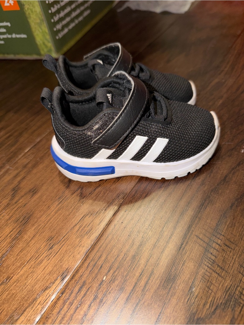 adidas Kids Black Sneakers with White Stripes and Blue Accent